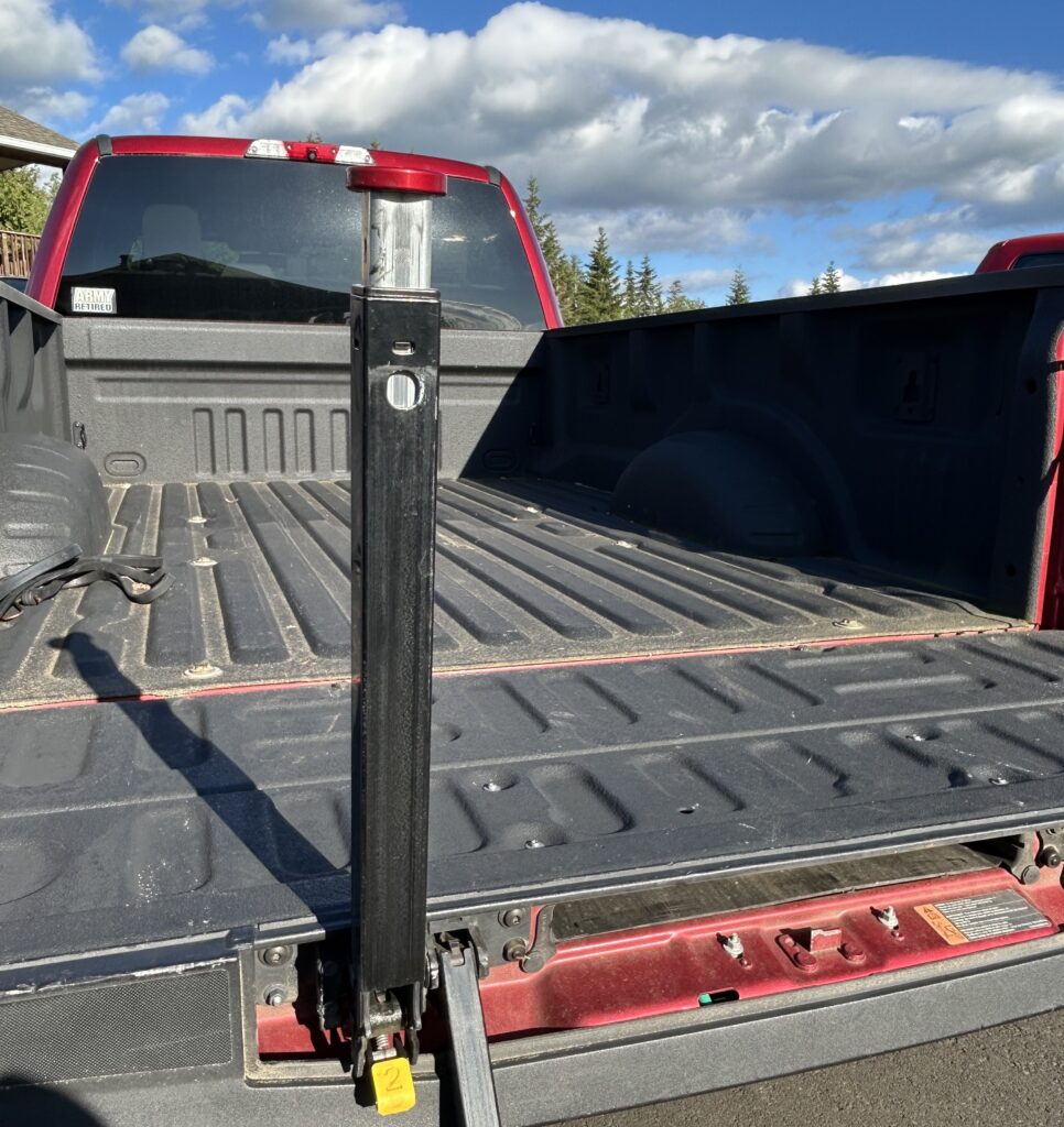 2019 Ford F-250 Super Duty with tailgate step handle extended after cap replacement